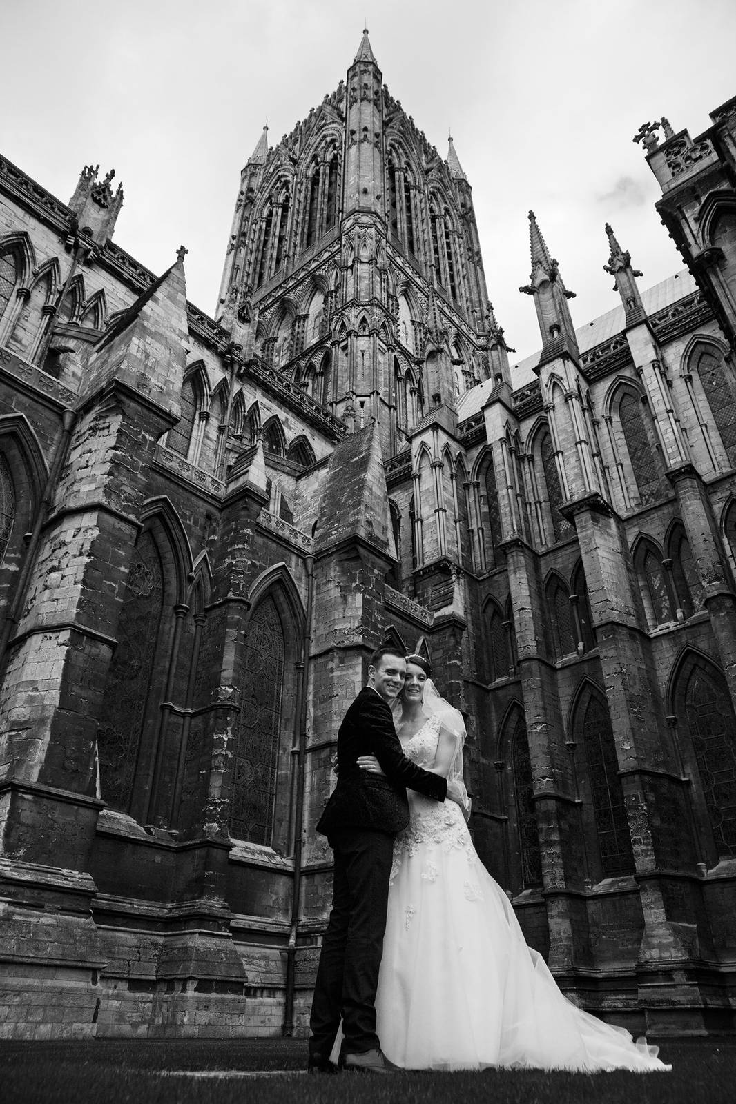 Portrait photography by Fez Photography — two people standing together, black and white